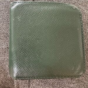 Louis Vuitton authentic Epicea Green Taiga Leather Bifold
Wallet with zipper
